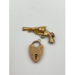 9ct gold heart shaped charm together with a yellow metal charm