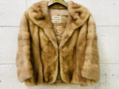 Fur jacket, by B. Manock