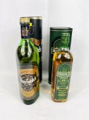 A bottle of Glenfiddich Scotch whisky and a bottle of Bushmills Irish whisky