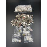 Quantity of silver town charms