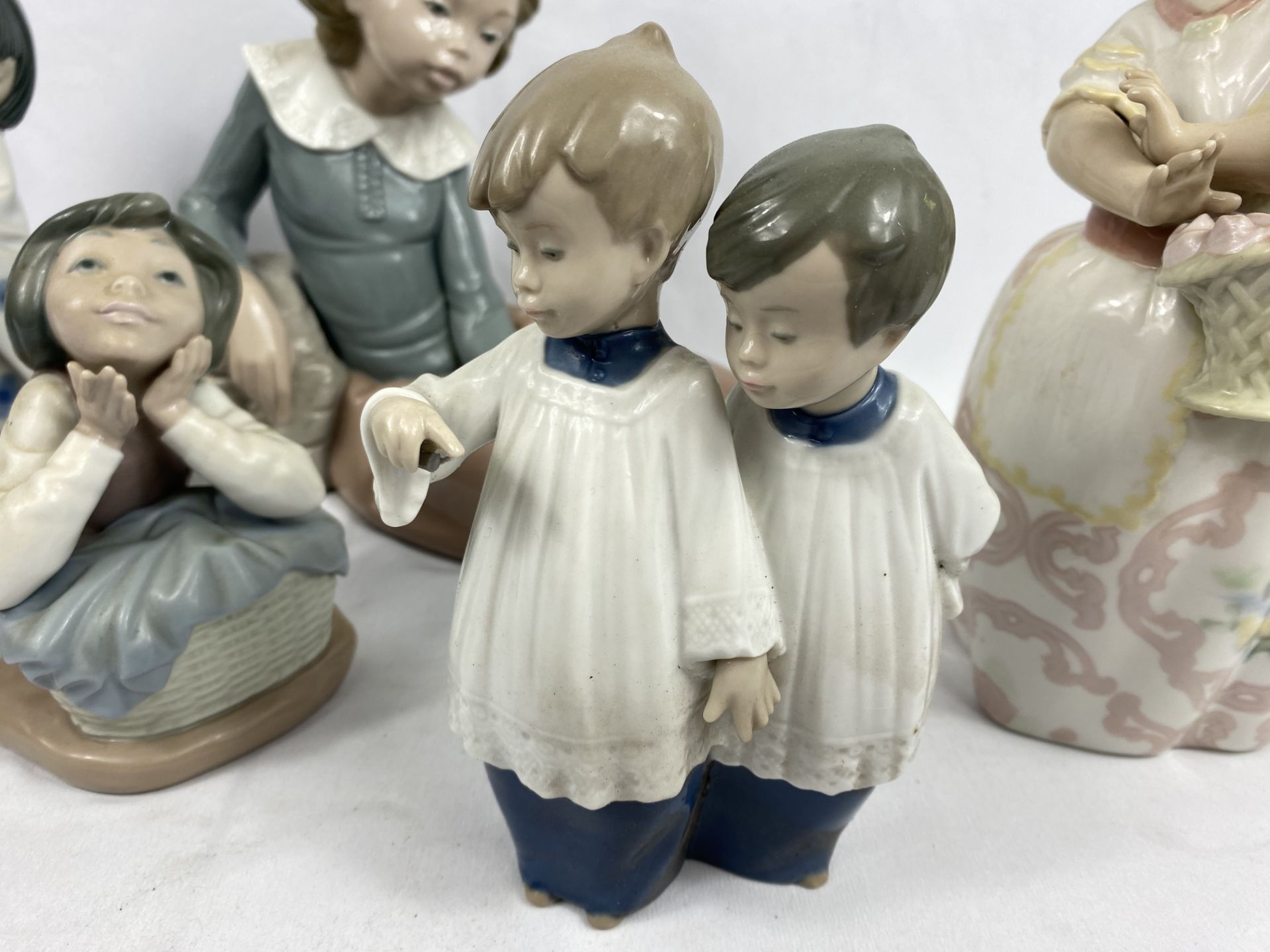 Three nao figurines, a Lladro figurine and one other - Image 5 of 6