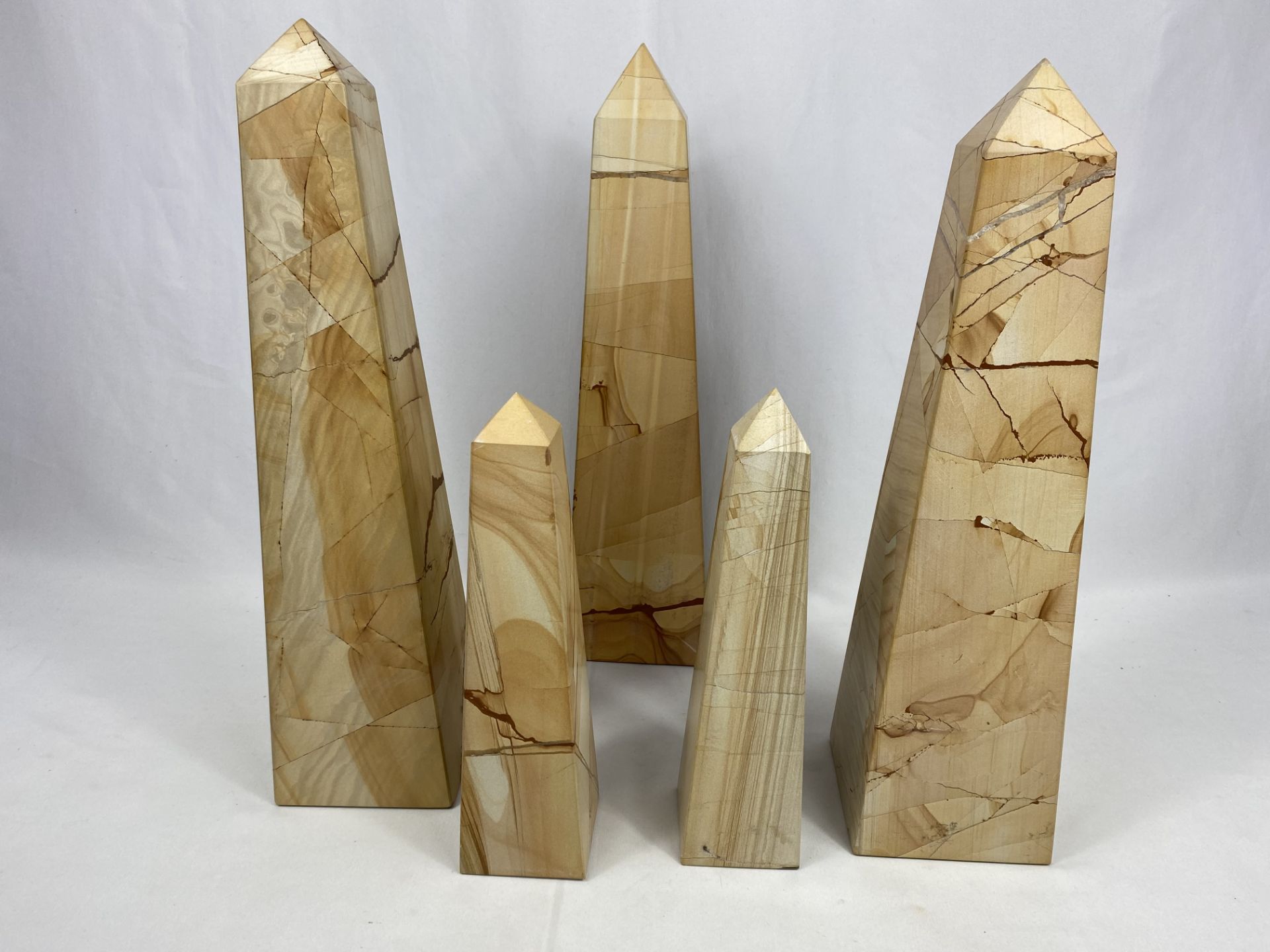 Three contemporary stone obelisks