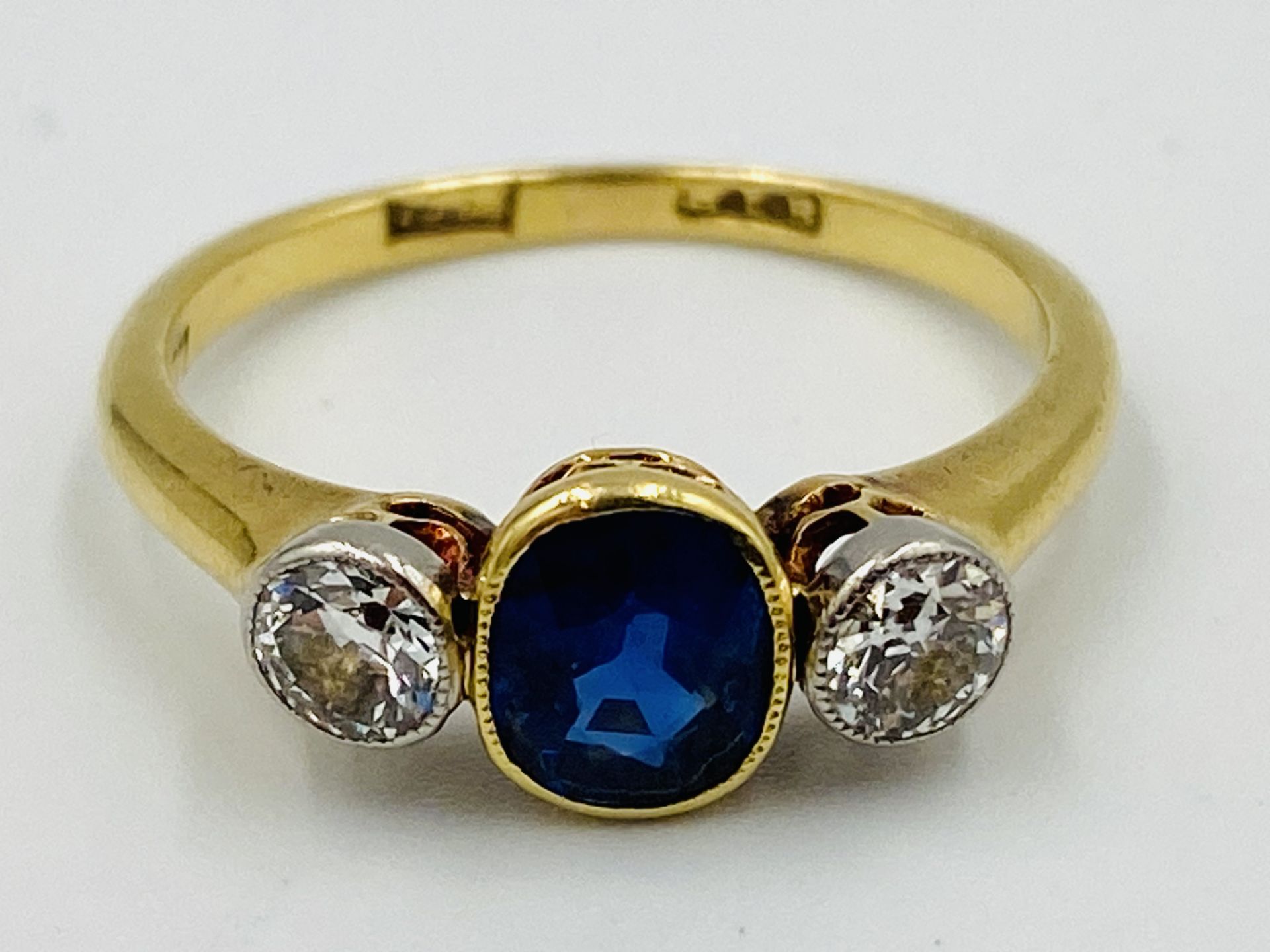 18ct gold and sapphire three stone ring