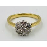 18ct gold and diamond cluster ring set with seven diamonds