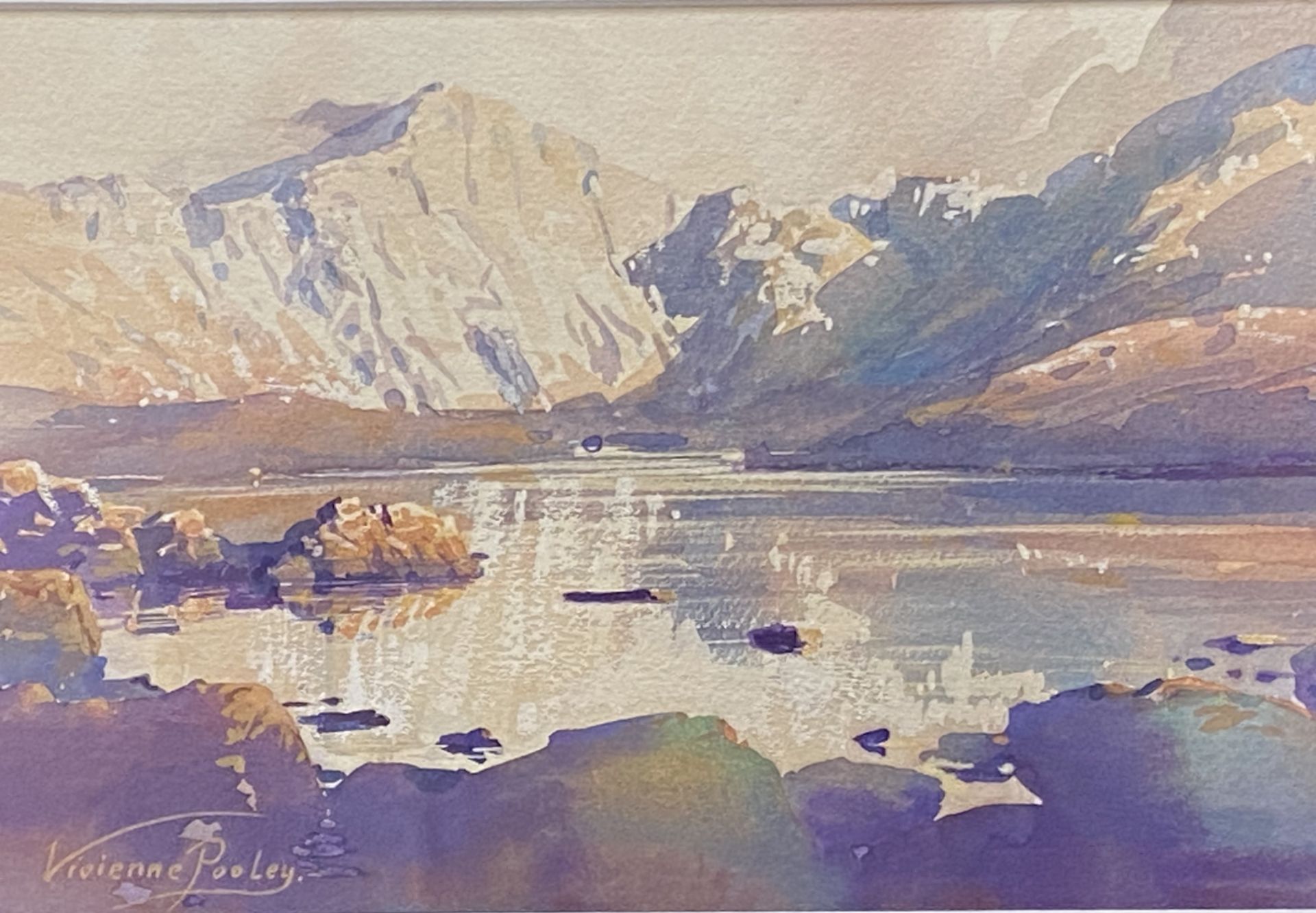 Framed and glazed watercolour of a lake