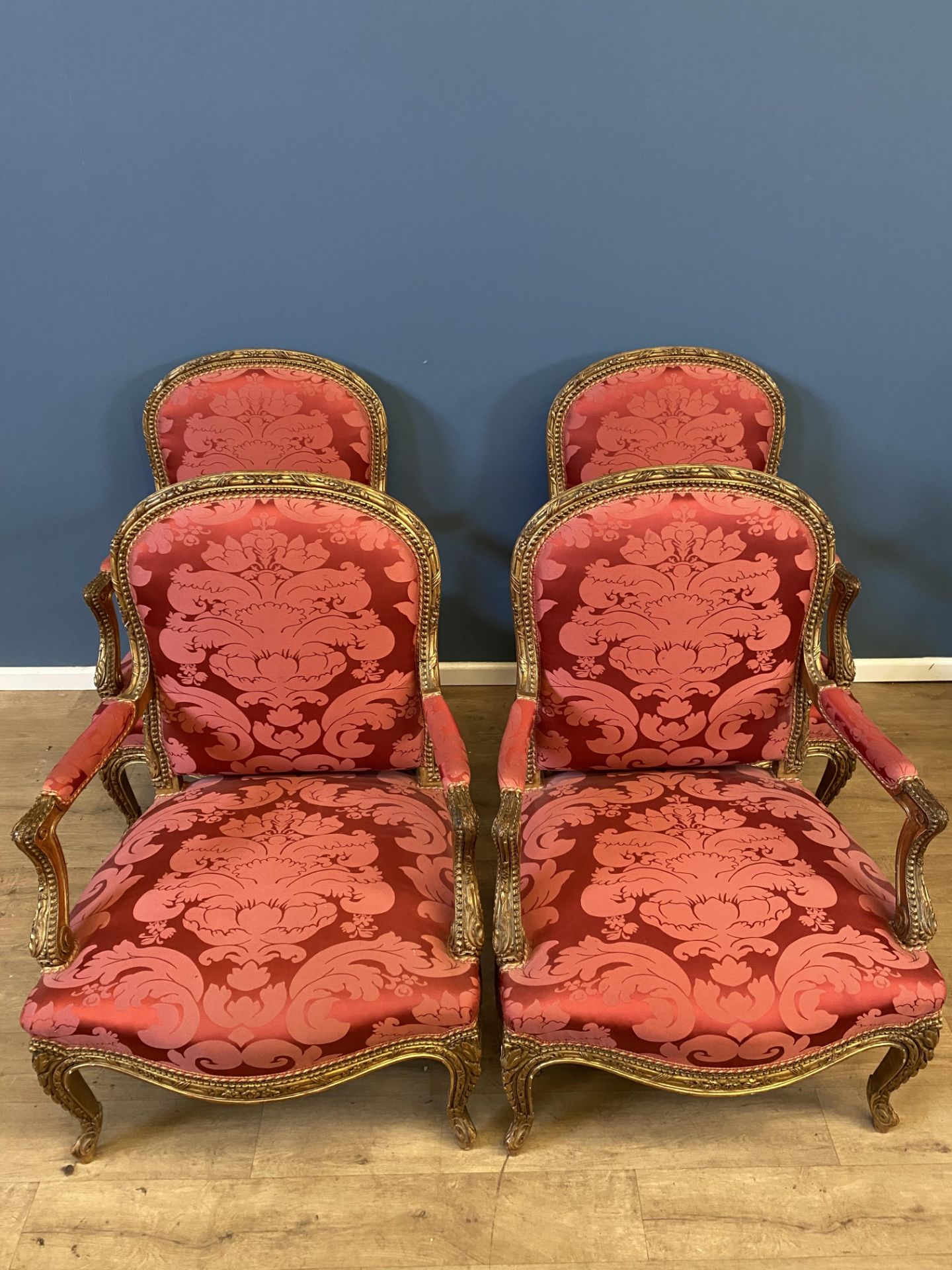 Four Louis XV style carved wood and gilt gesso chairs