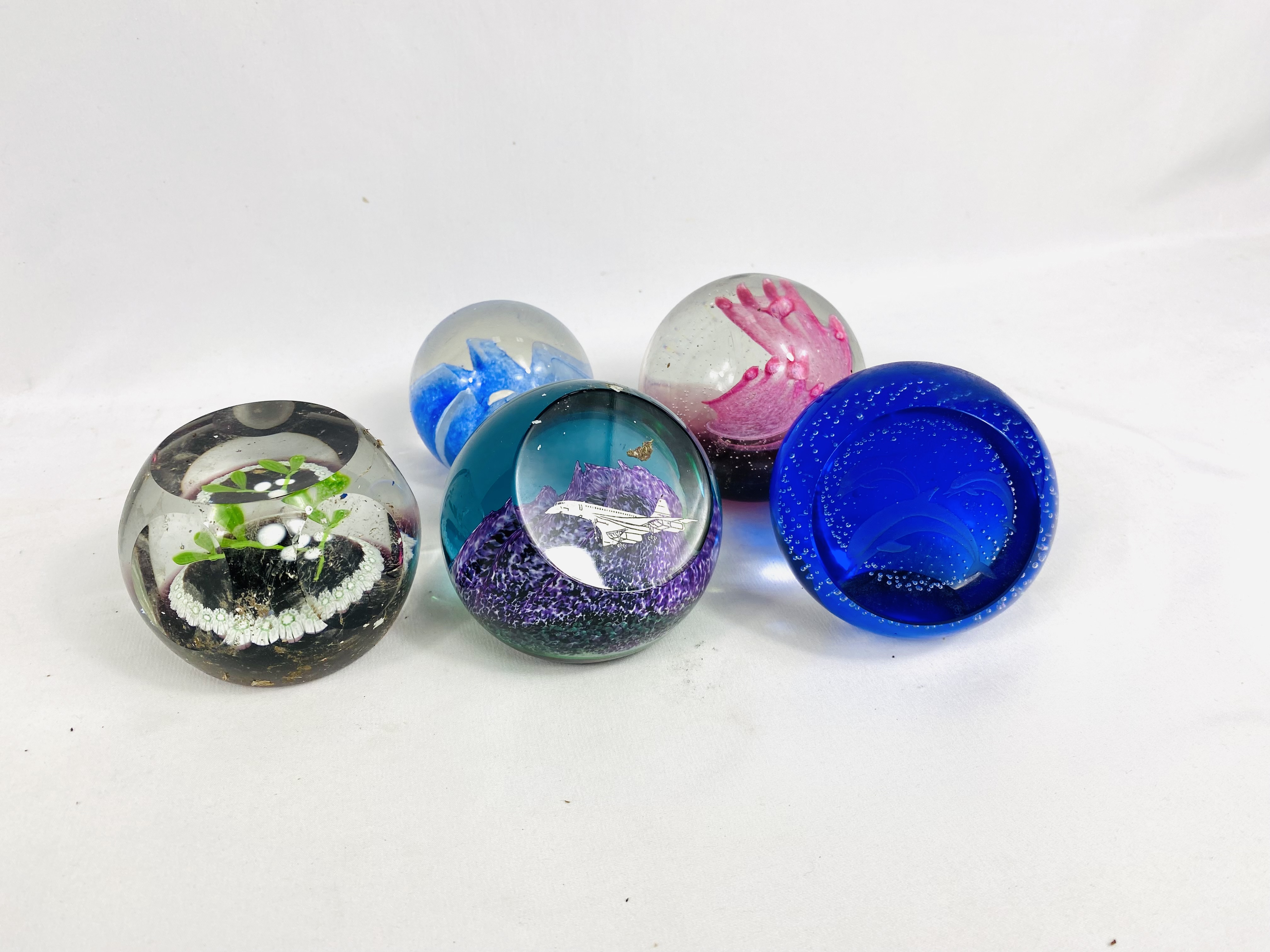 Five Caithness paperweights