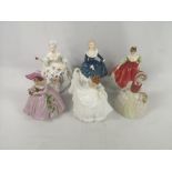 Six porcelain figurines to include four Royal Doulton