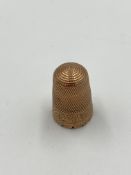 Yellow metal thimble