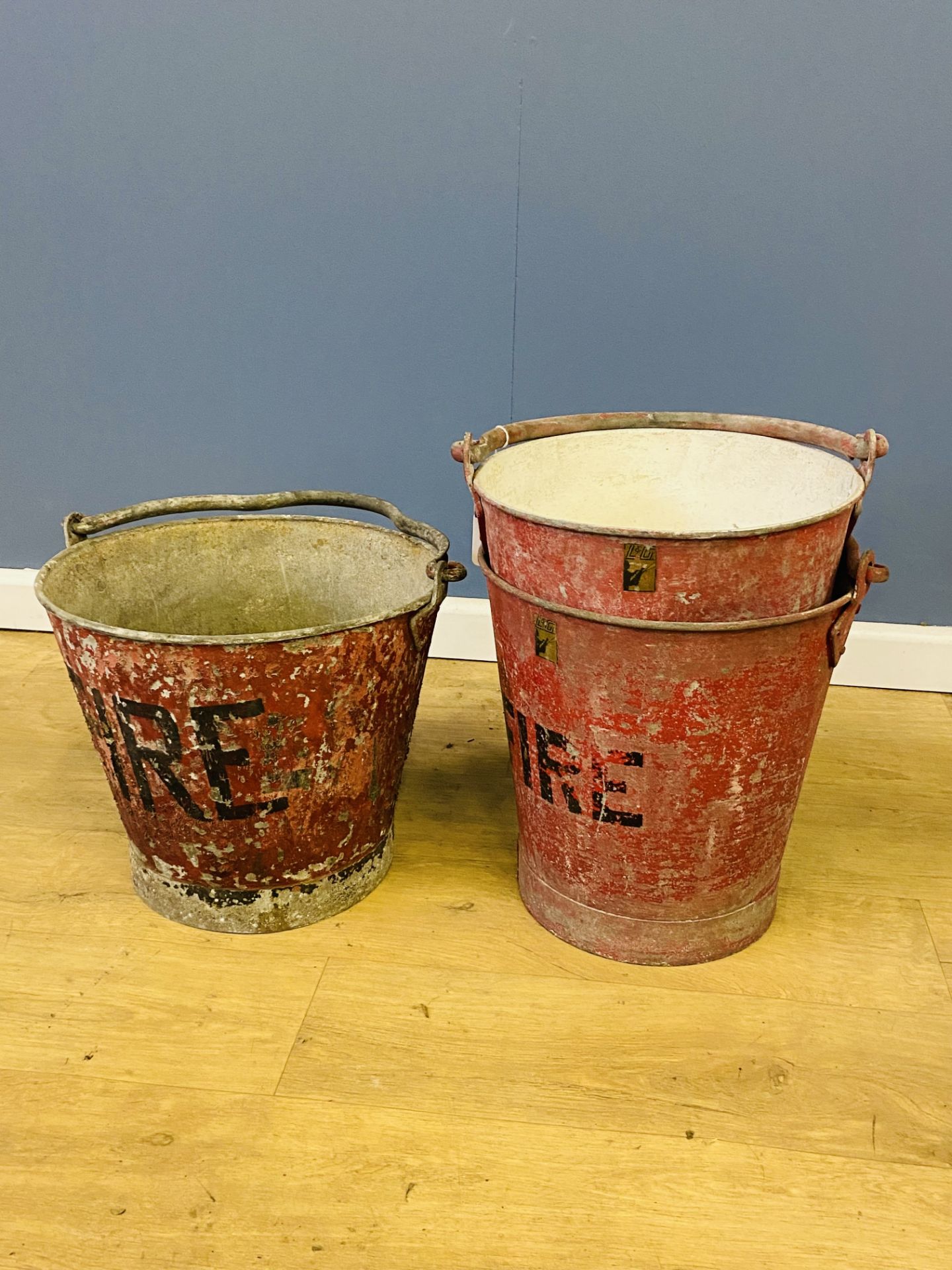 Three galvanised red painted fire buckets, - Image 2 of 3