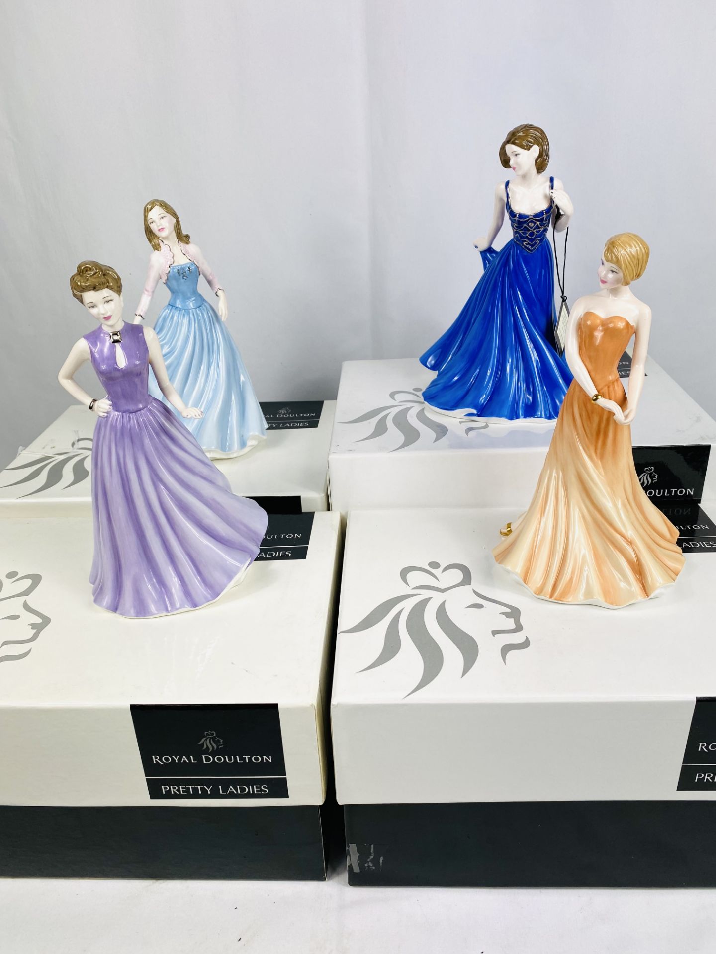 Four boxed Royal Doulton figurines