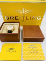 Breitling for Bentley. A Special Edition 18K gold automatic calendar chronograph wristwatch