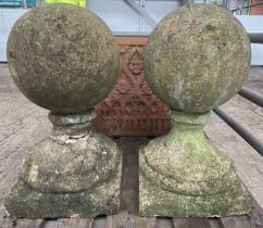 Two cast stone balls on plinths. From the Estate of Dame Mary Quant
