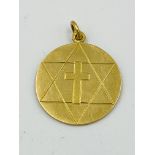 18ct gold religious pendant