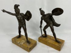 Two bronzed figurines of Greek soldiers on marble base. From the Estate of Dame Mary Quant