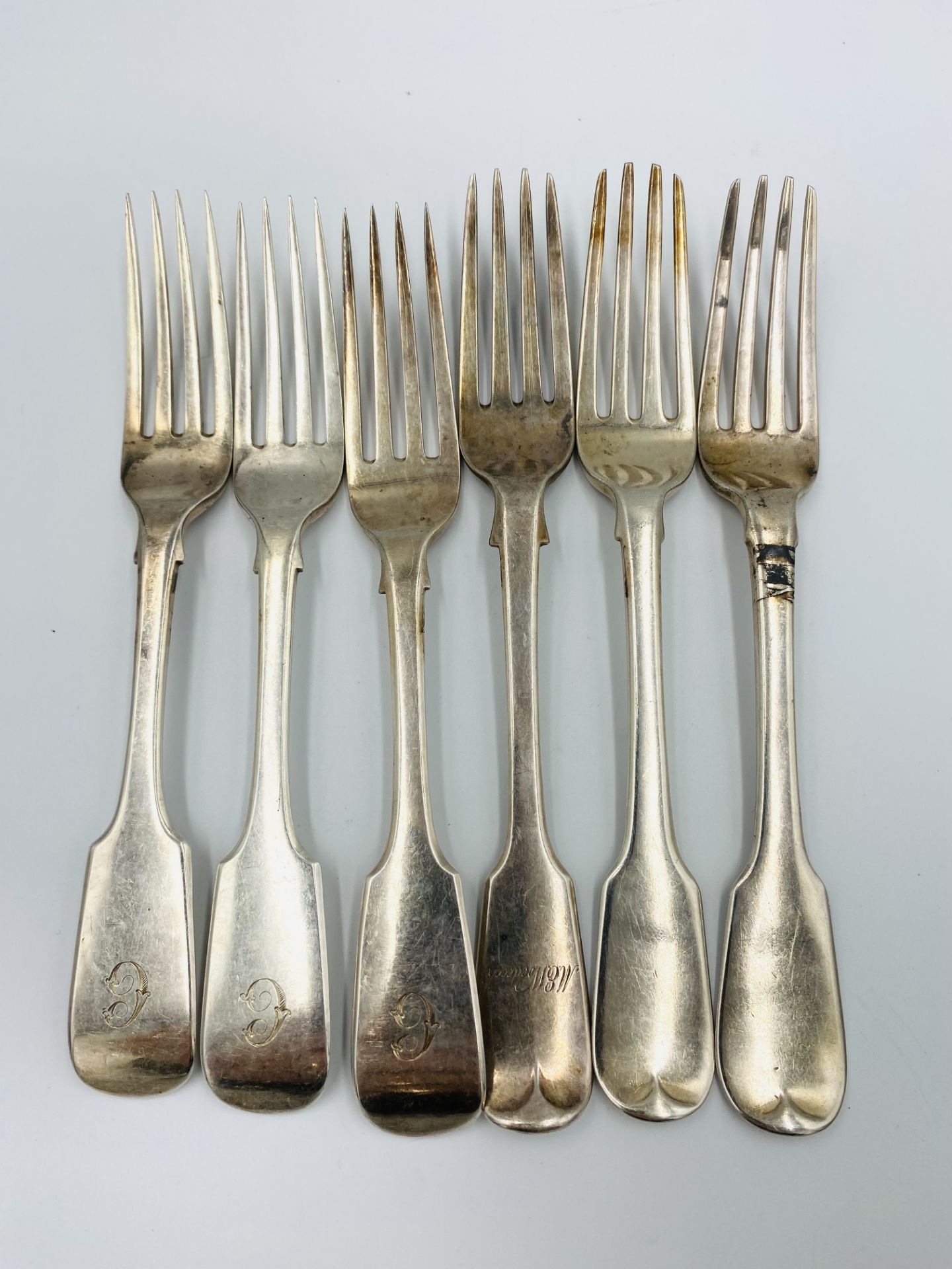 Six silver forks