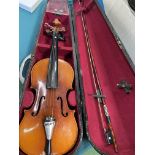 Three violins in hard cases