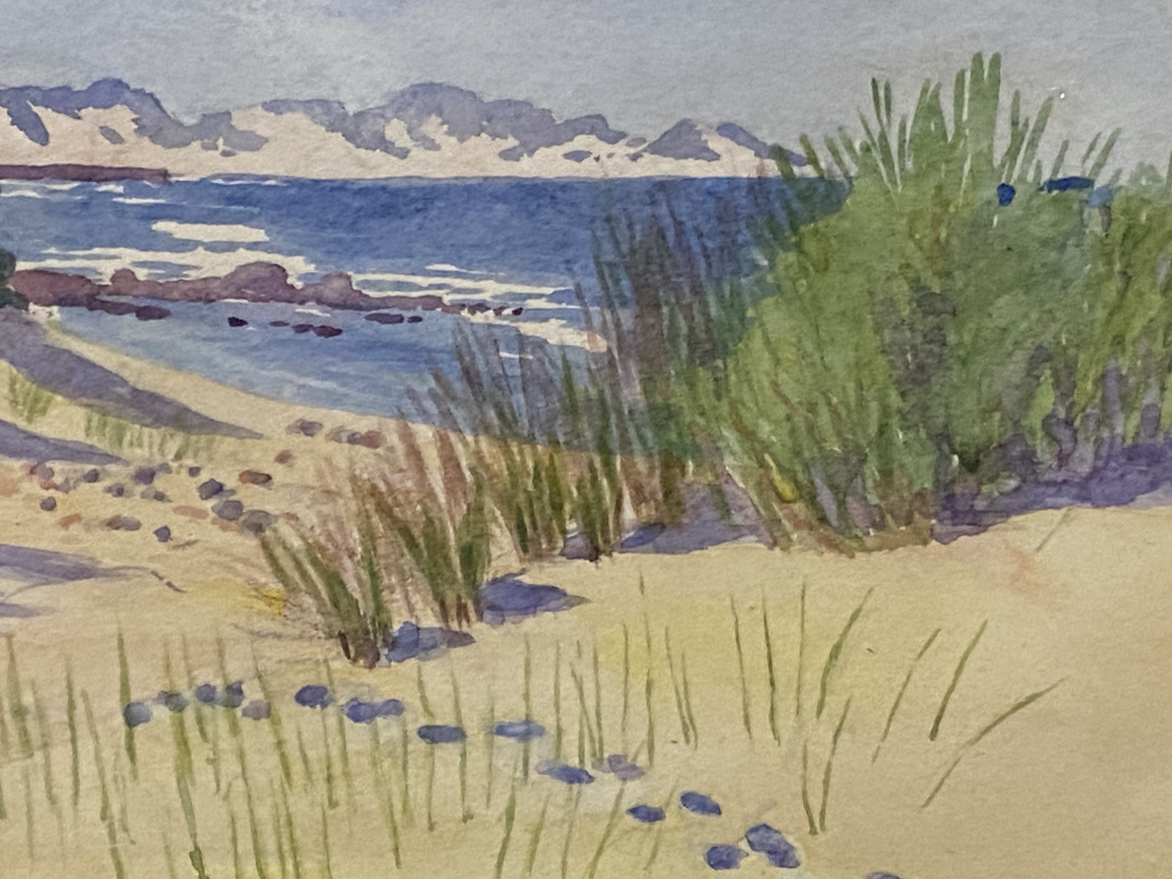 Framed and glazed watercolour of a beach initialed NTG