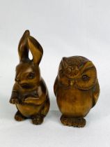 Two carved wood netsuke