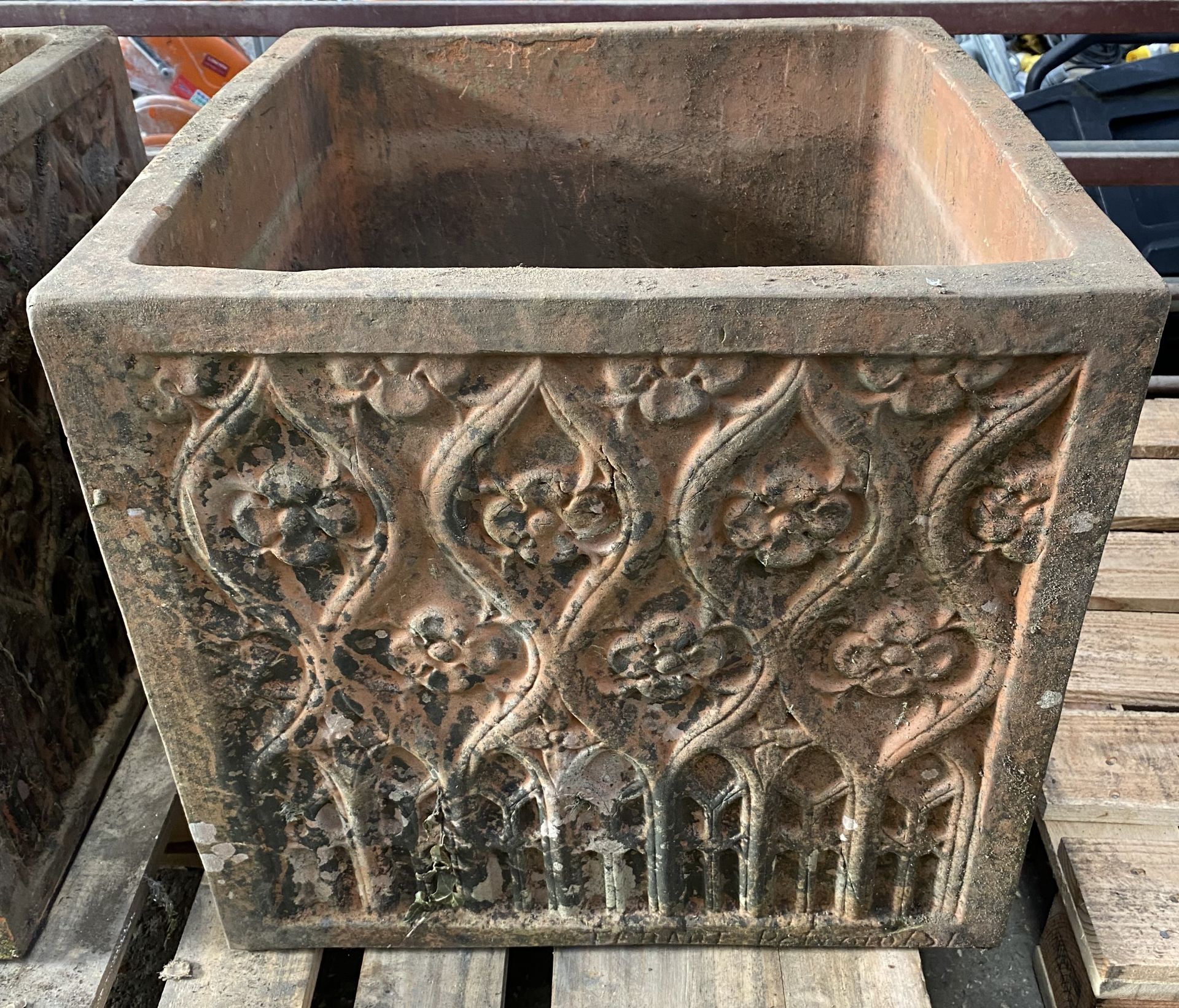 Terracotta planter with foliate decoration to sides. From the Estate of Dame Mary Quant