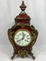 French Palais Royal wood and ormolu mantel clock. From the Estate of Dame Mary Quant