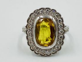 18ct white gold, yellow sapphire and diamond ring