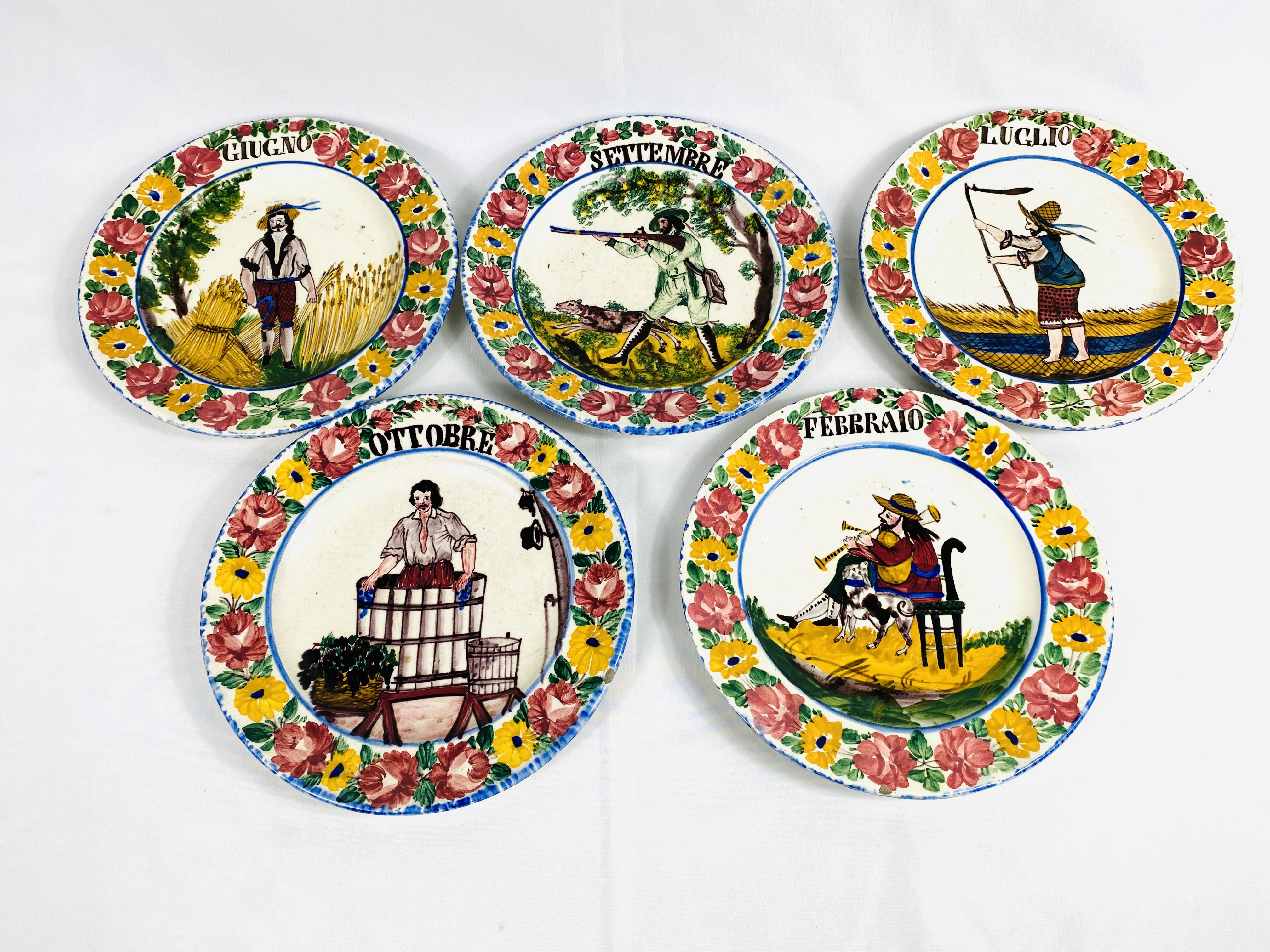 Set of twelve majolica hand painted plates. From the Estate of Dame Mary Quant