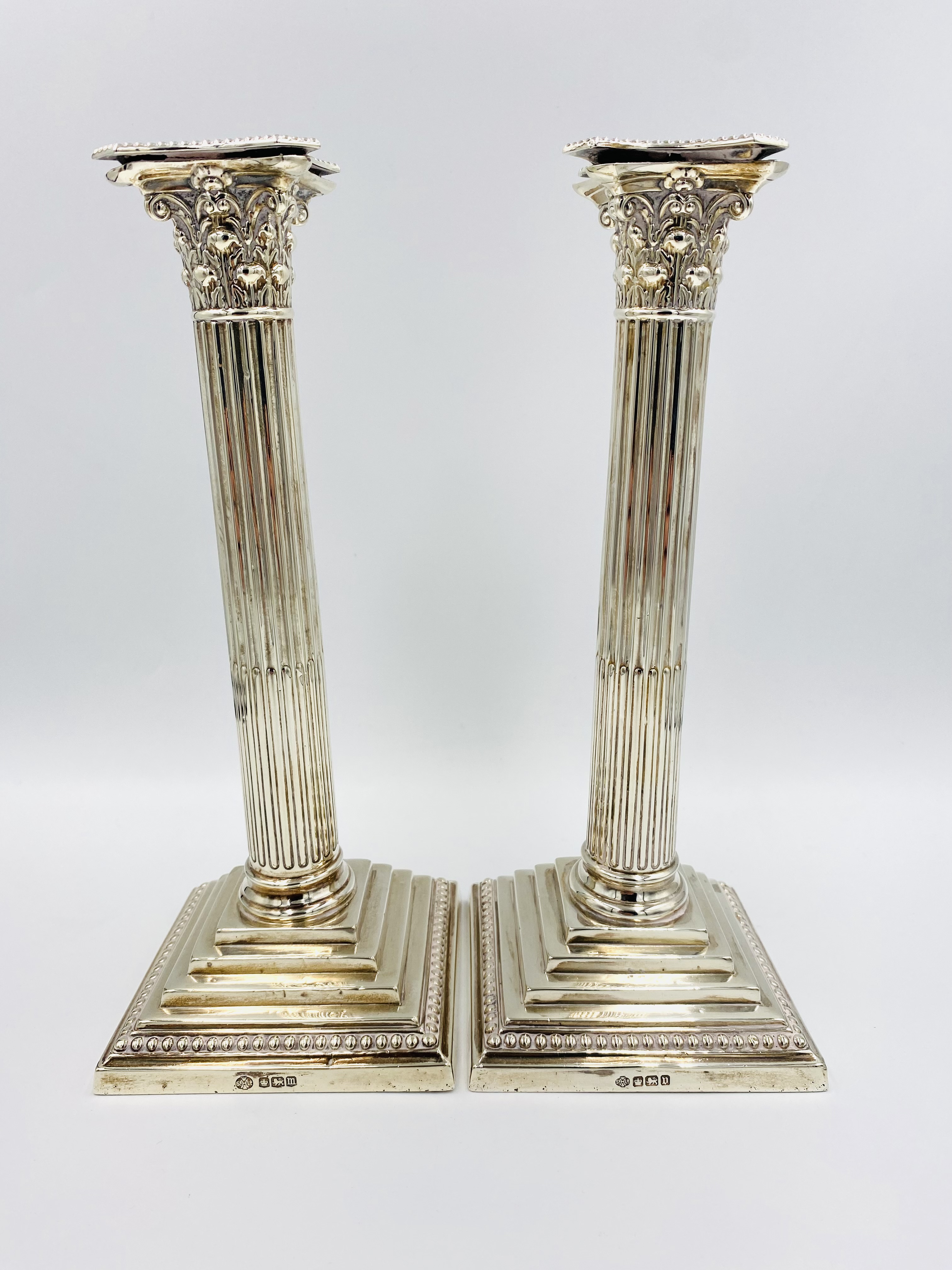 Pair of filled silver candlesticks, Sheffield 1904