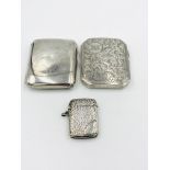 Two silver cigarette cases together with a silver vesta case