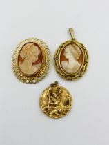 Two cameo brooches and a St Christopher pendant