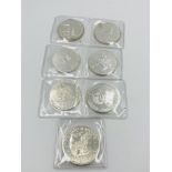 Six Canadian silver coins together with a USA silver coin