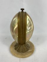 Mother of pearl pocket watch holder. From the Estate of Dame Mary Quant