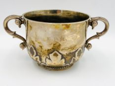 A silver two handled cup . From the Estate of Dame Mary Quant