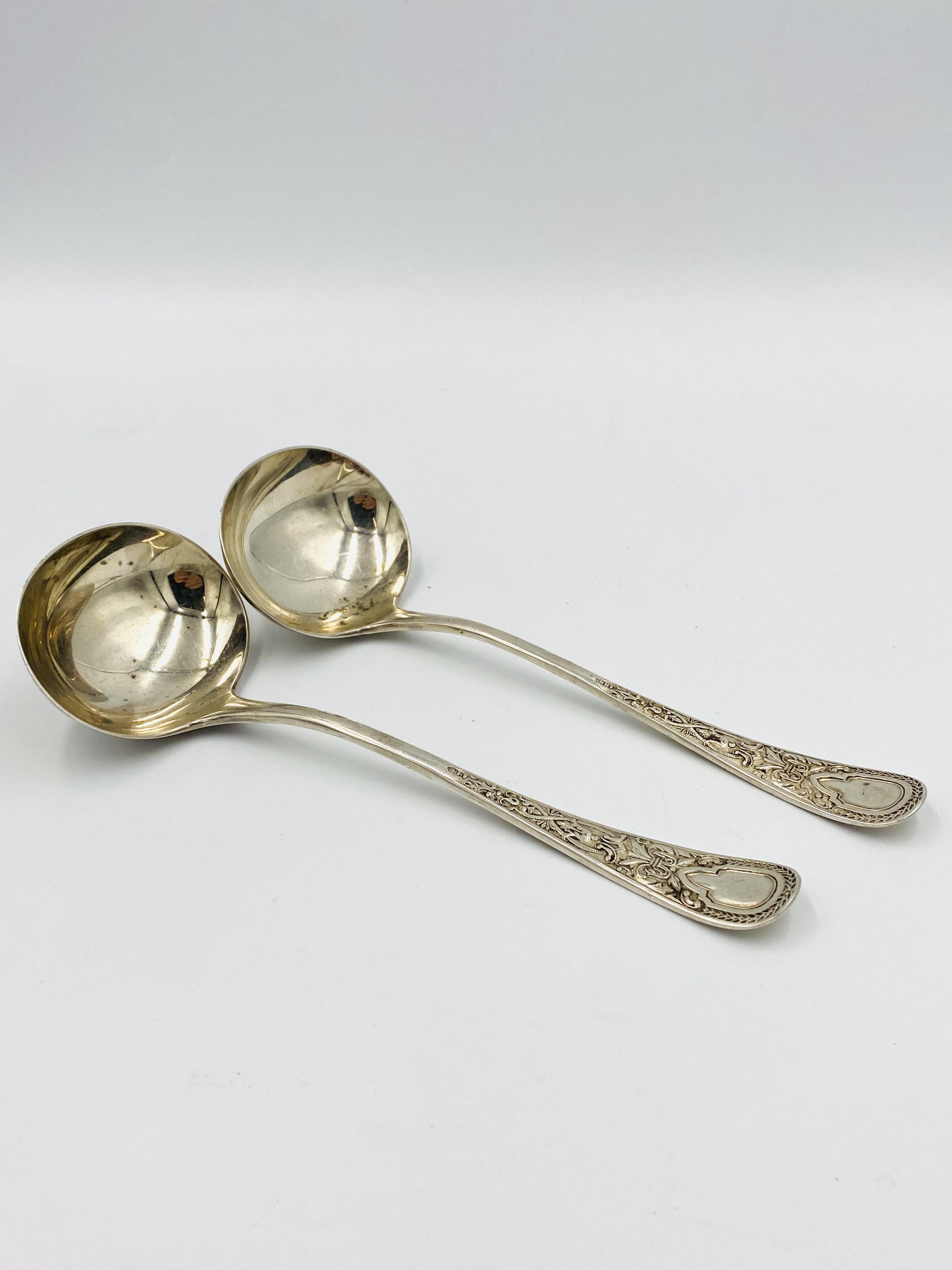 Pair of silver sauce ladles