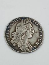 William III 1697 silver sixpence; together with two other coins