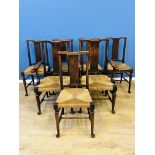 Seven oak framed dining chairs