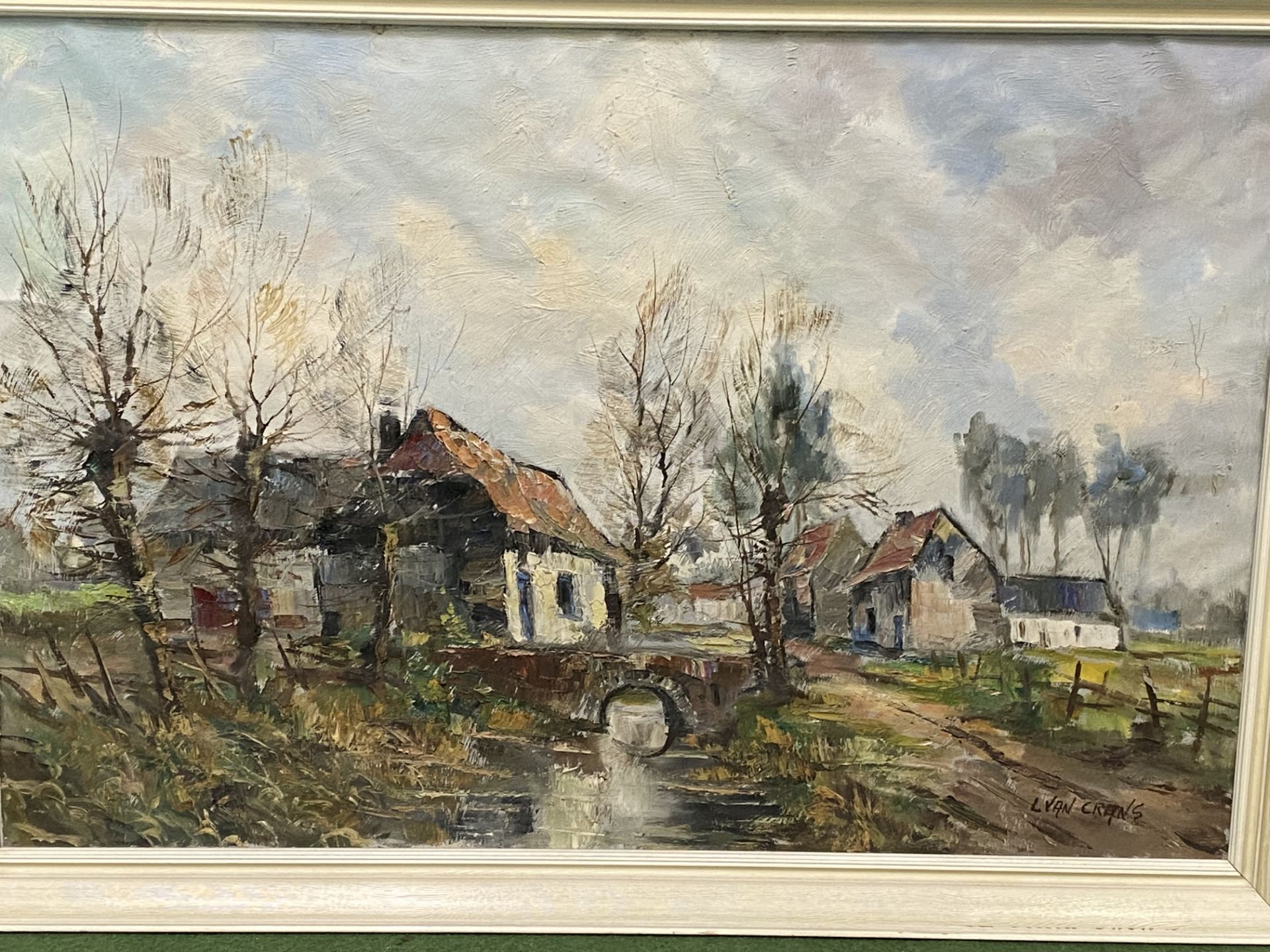 Framed oil on canvas of a village in winter, signed L Van Crans - Image 2 of 4