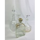 Four glass decanters