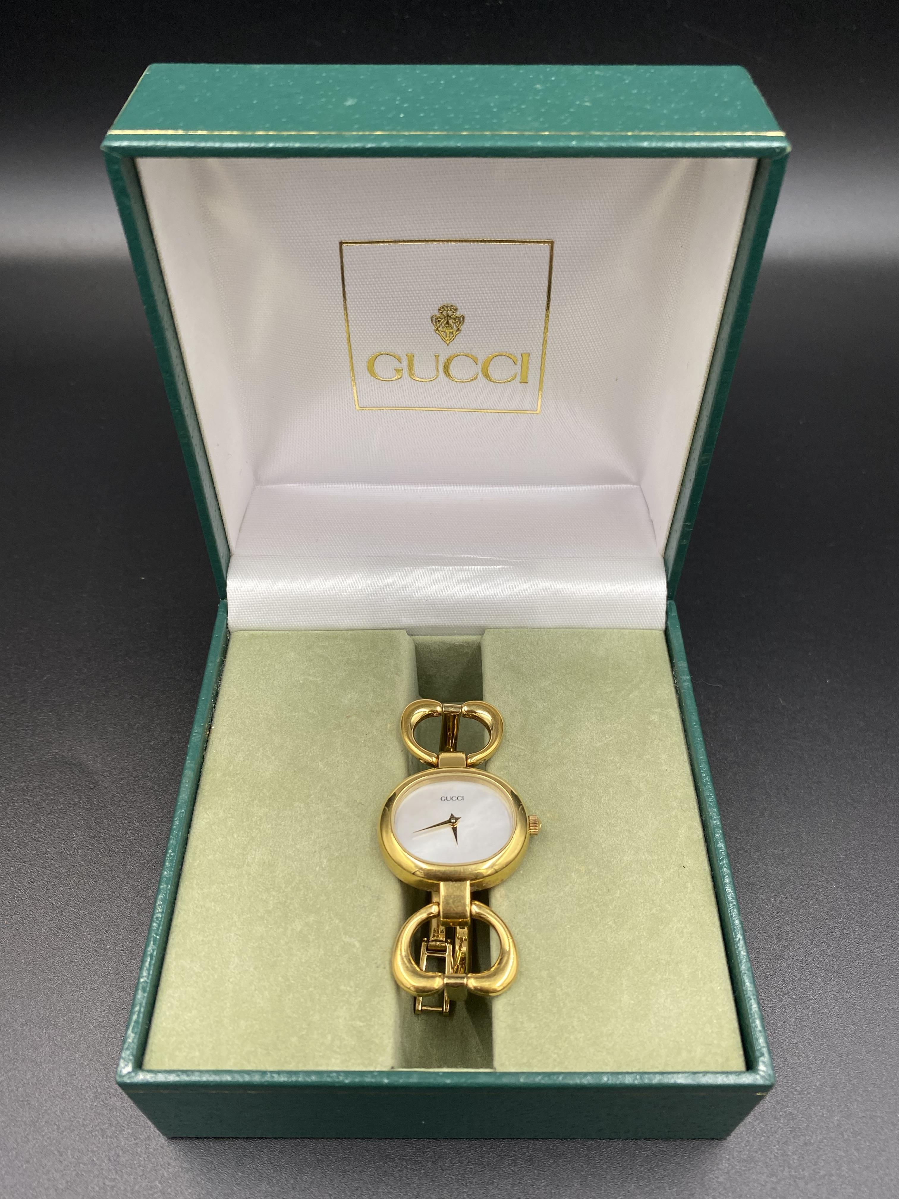 18ct gold ladies Gucci watch