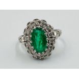 White gold, emerald and diamond ring