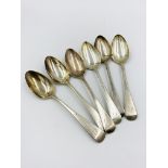 Six silver spoons