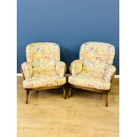 Two Ercol spindle back armchairs