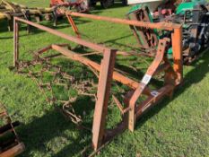 Mounted folding grass harrows