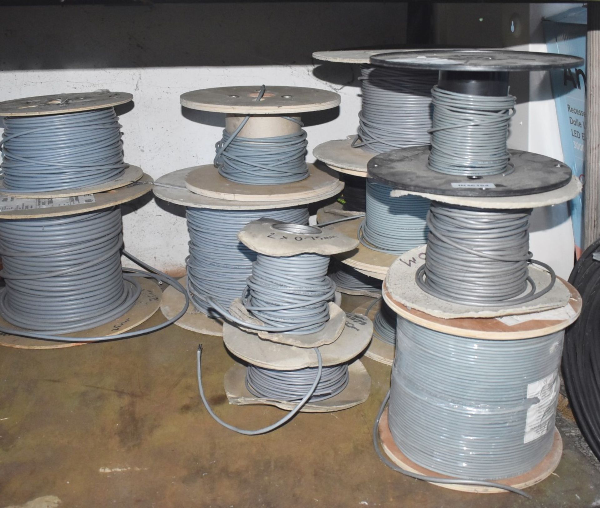 13 x Reels of Grey Electrical Cable - Includes New Reels and Part Used Reels of 100m and 500m Cable - Image 2 of 9