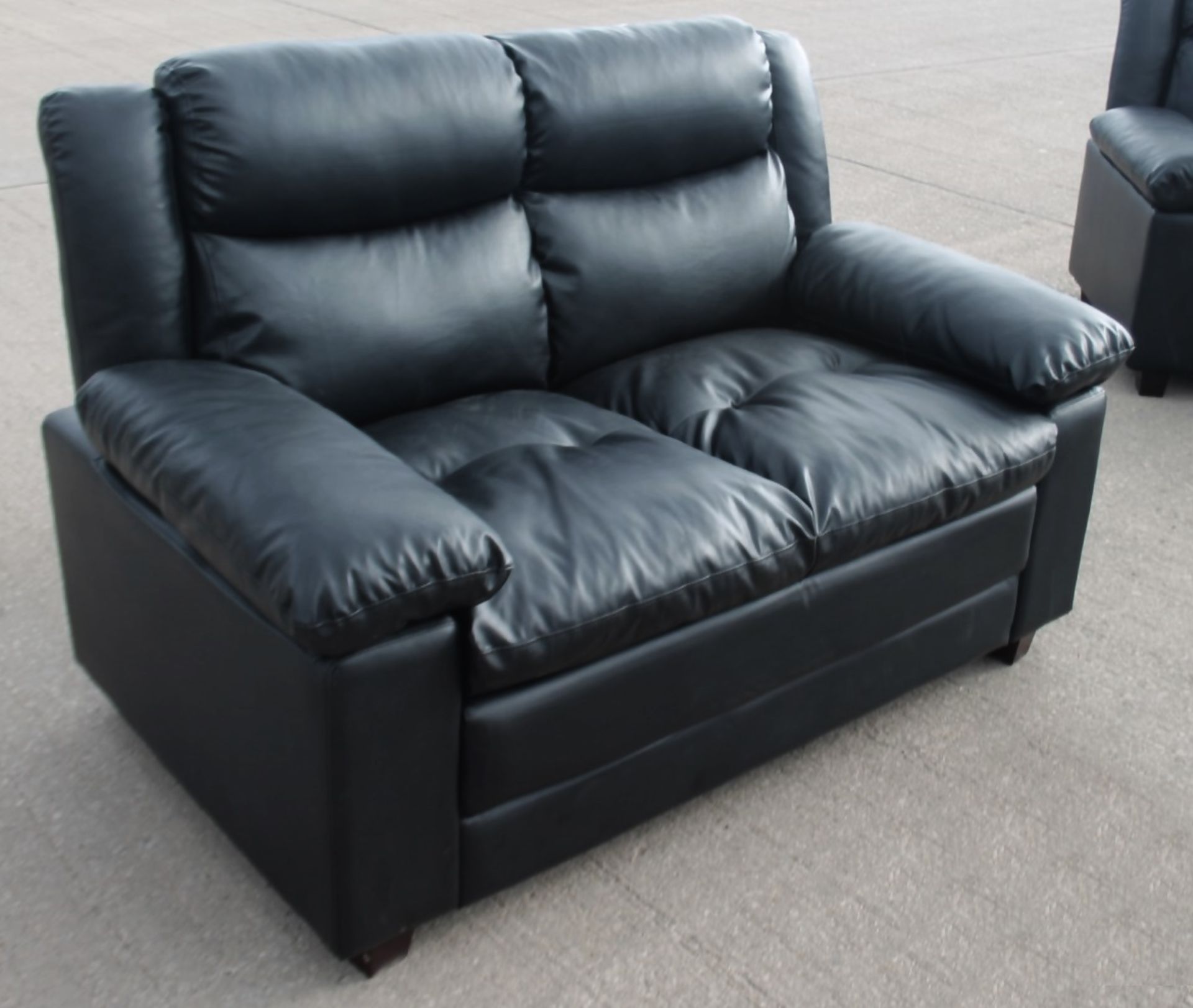 1 x 2-Seater Sofa, Upholstered In A Premium Black Faux Leather - From An Exclusive Property - NO VAT - Image 2 of 4