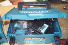 2 x Makita 18V Batteries and 1 Charger in Case - Ref: SRB242 - CL816 - Location: Birmingham, B45<