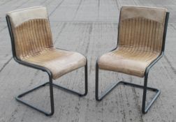 A Pair Of Cantilever Chairs With A Distressed Finished - Recently Relocated From An Exclusive