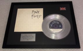 1 x Pink Floyd 'Another Brick in the Wall' Silver 7 Inch Vinyl - Mounted and Presented in Black