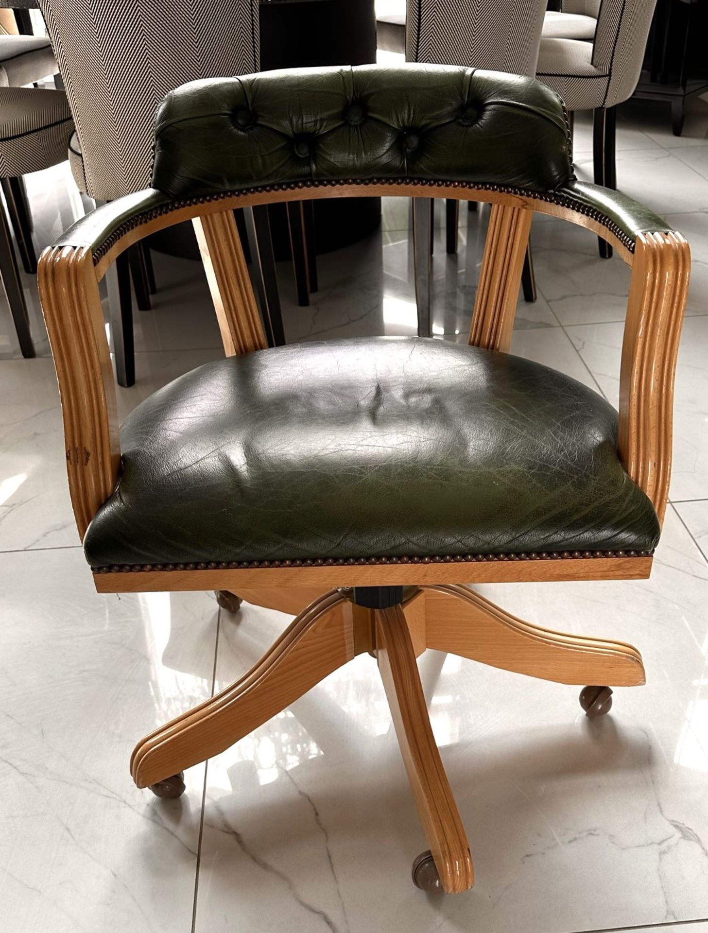 1 x VINTAGE 1970's Padded Captains Chair In Green Leather And Solid Wood Legs On Wheels