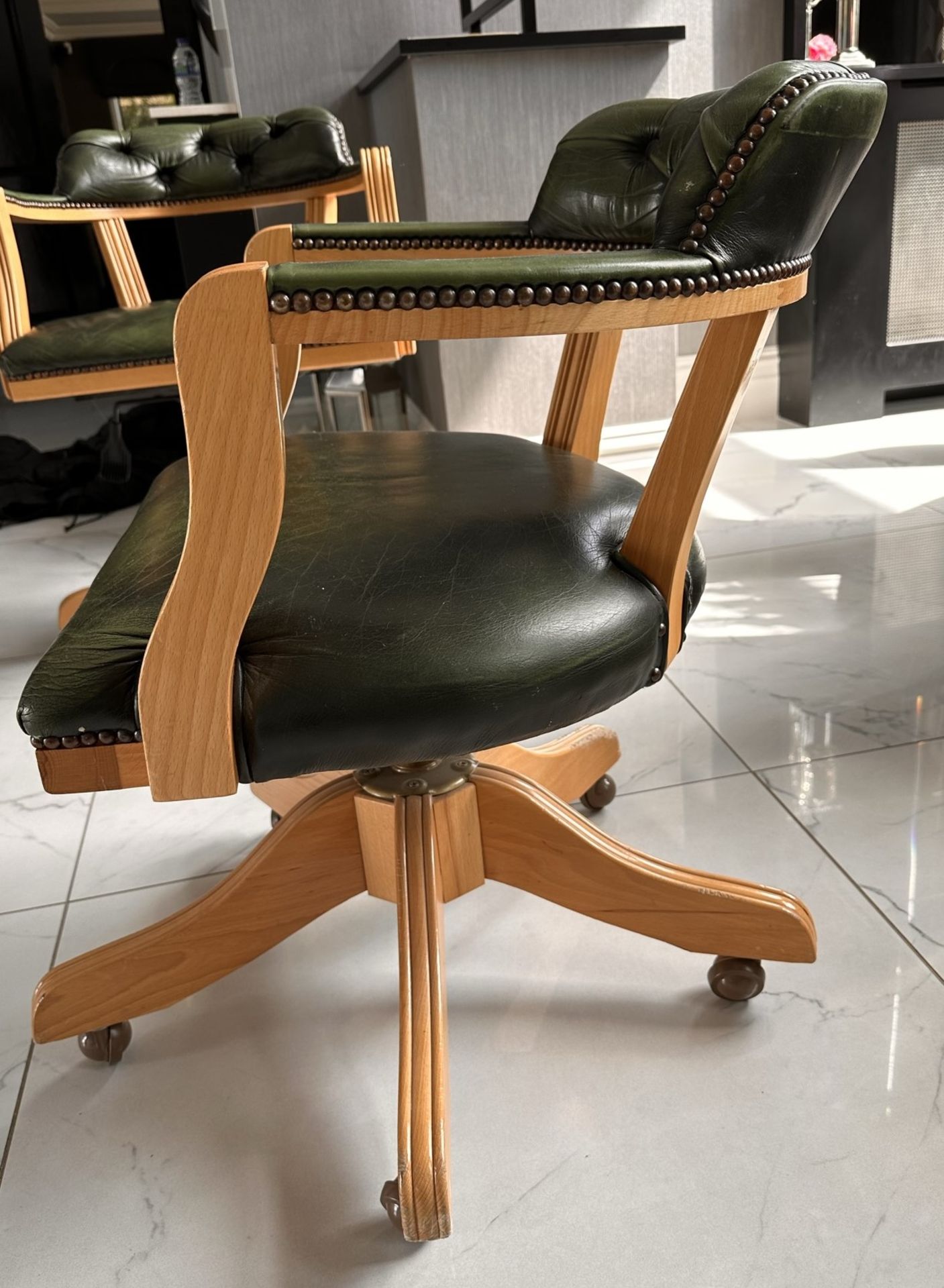 1 x VINTAGE 1970's Padded Captains Chair In Green Leather And Solid Wood Legs On Wheels - Image 2 of 4